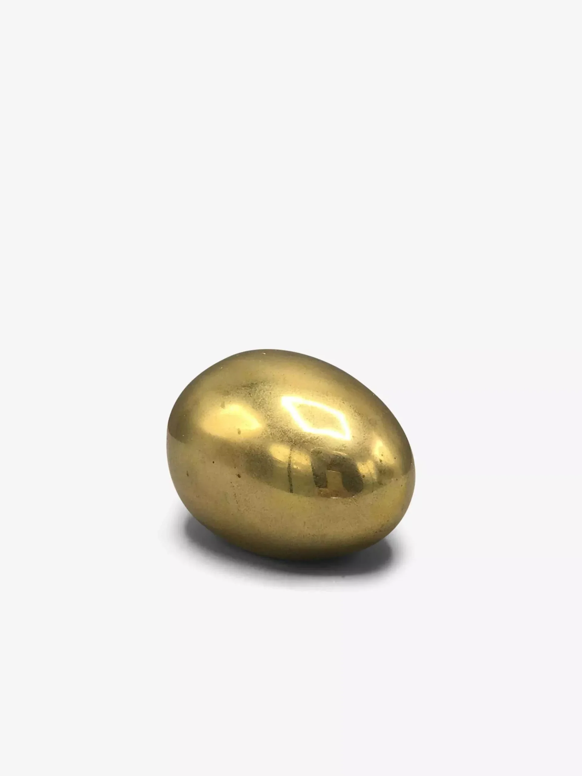 Egg Paperweight in Brass